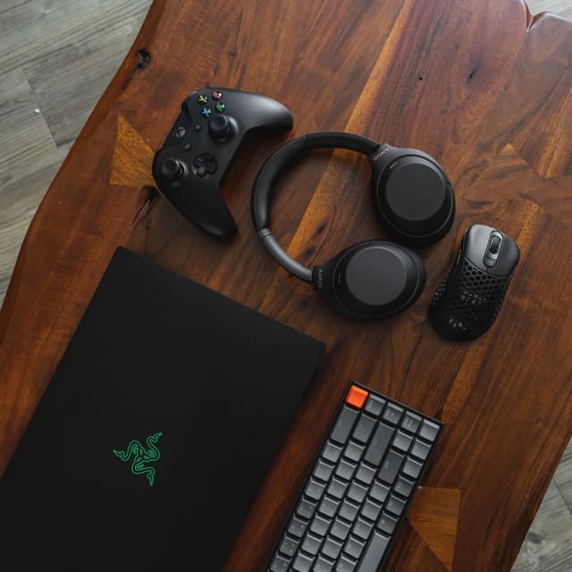 Gaming Laptops with controller and headphone.